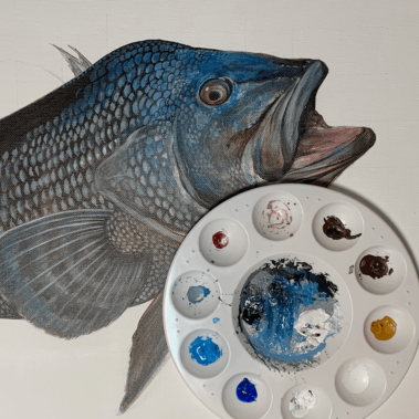 A painting of a fish with paint pallette